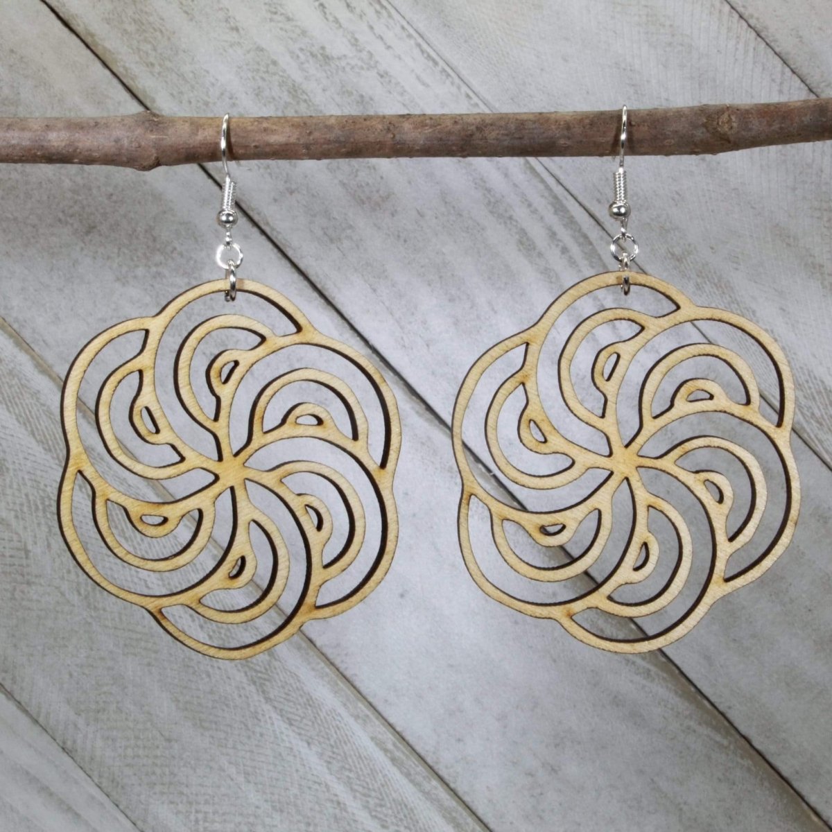 Hand-painted wooden hurricane swirl dangle earrings with Art Deco-inspired geometric design and hypoallergenic sterling silver hooks, lightweight swirl statement jewelry earrings for bold vintage style 