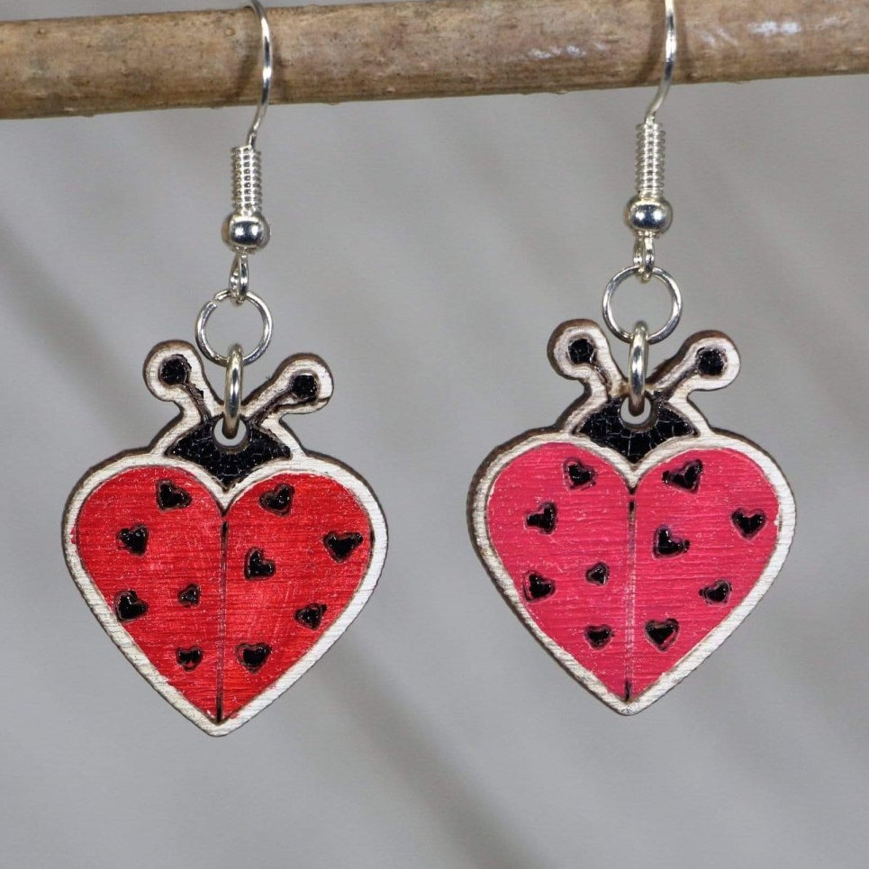 Hand-painted wooden ladybug dangle earrings with cute insect nature design and hypoallergenic sterling silver hooks, lightweight ladybug statement jewelry earrings for garden lovers and whimsical style