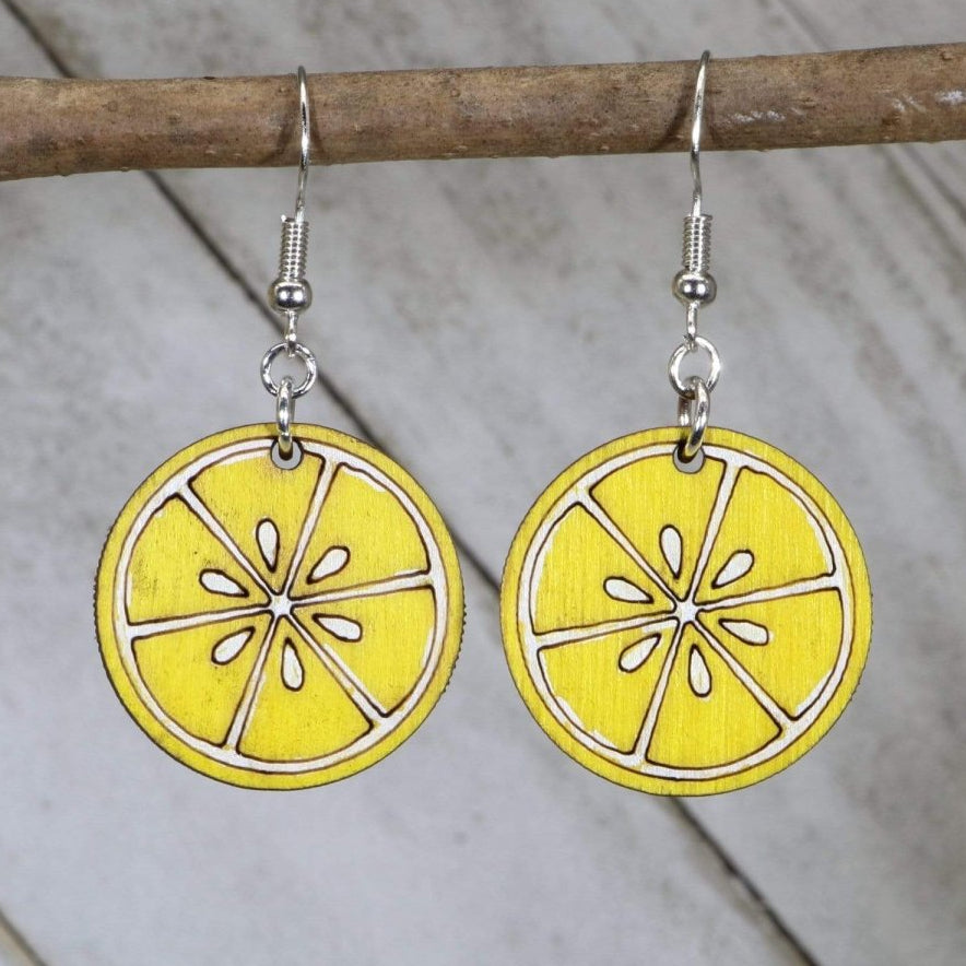 Hand-painted wooden lemon slice dangle earrings with bright citrus fruit design and hypoallergenic sterling silver hooks, lightweight summer statement jewelry earrings for fresh fruity and tropical style
