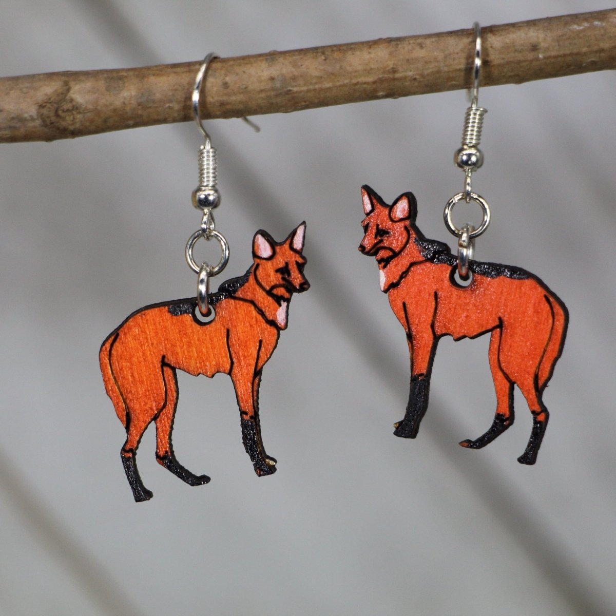 Hand-painted wooden maned wolf dangle earrings with detailed wildlife animal design and hypoallergenic sterling silver hooks, lightweight wolf statement jewelry earrings for nature lovers and exotic animal fans
