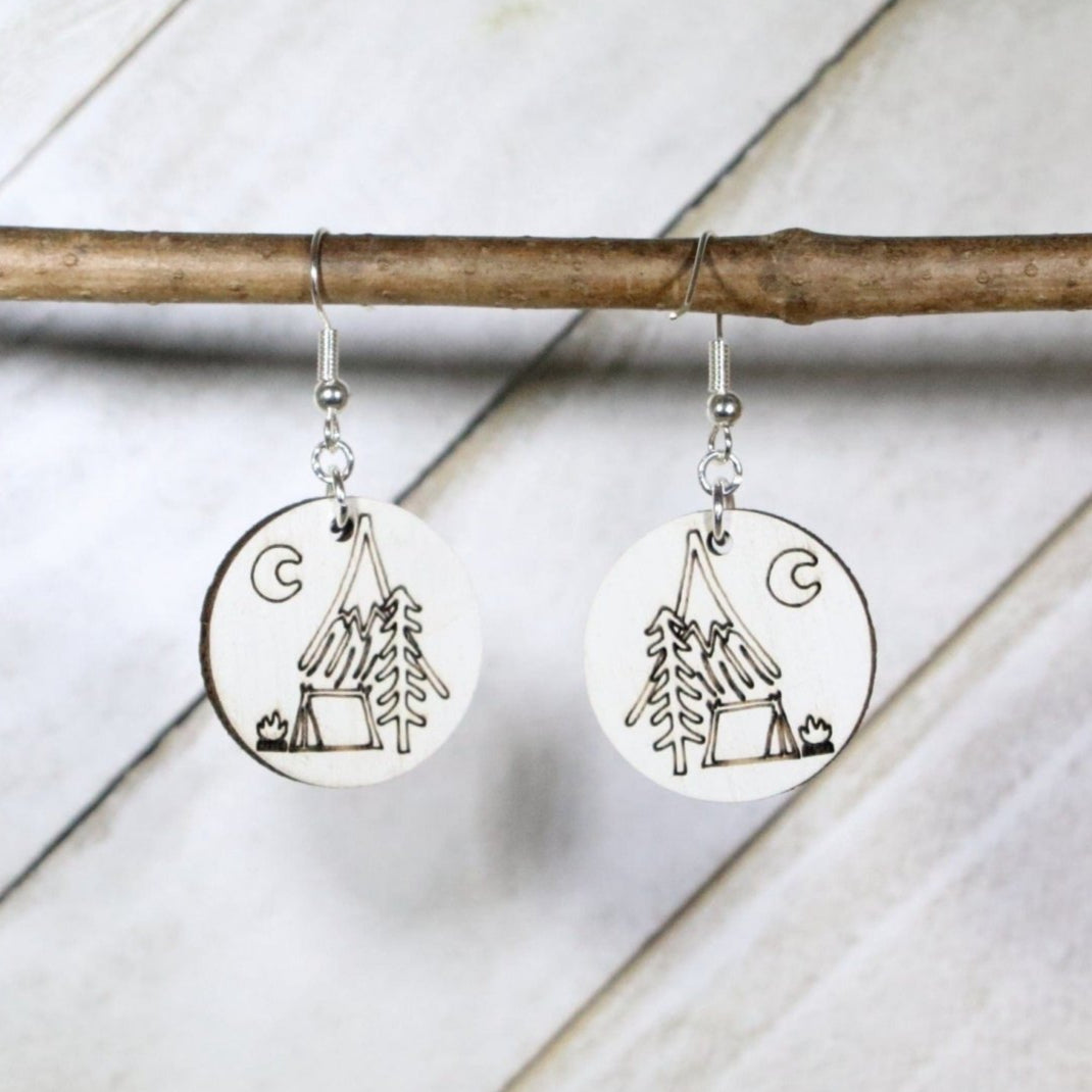 Hand-painted wooden moonlit camp dangle earrings with nighttime camping scene design and hypoallergenic sterling silver hooks, nature lover statement jewelry for campers and outdoor adventure fans