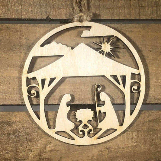 Hand-painted wooden nativity scene Christmas ornament featuring a detailed manger scene with Mary, Joseph, and baby Jesus, meaningful holiday decor for Christian families and religious celebrations by Cate’s Concepts

