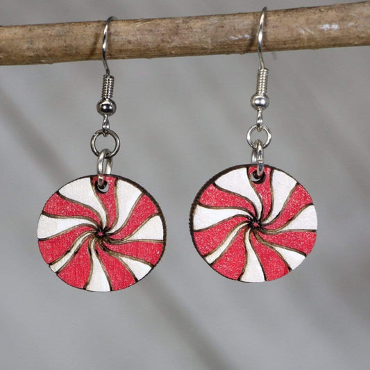 Hand-painted wooden peppermint candy dangle earrings with festive Christmas swirl design and hypoallergenic sterling silver hooks, lightweight candy statement jewelry earrings for holiday and winter style