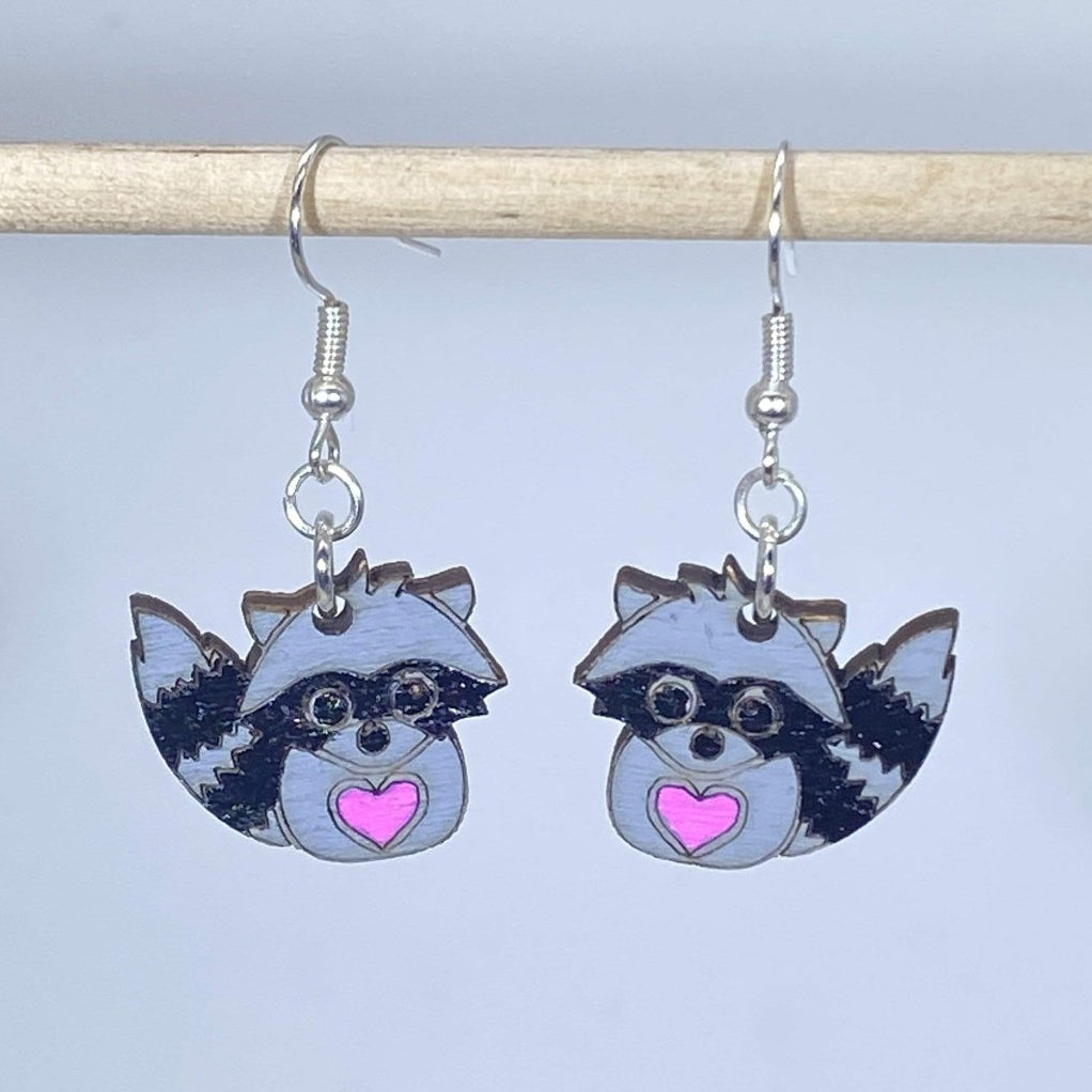 Hand-painted wooden raccoon dangle earrings with cute woodland animal design and hypoallergenic sterling silver hooks, lightweight raccoon statement jewelry earrings for forest lovers and playful style