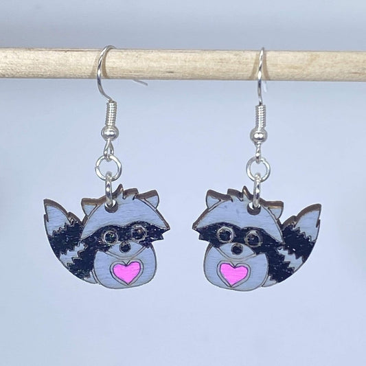 Hand-painted wooden raccoon dangle earrings with cute woodland animal design and hypoallergenic sterling silver hooks, lightweight raccoon statement jewelry earrings for forest lovers and playful style