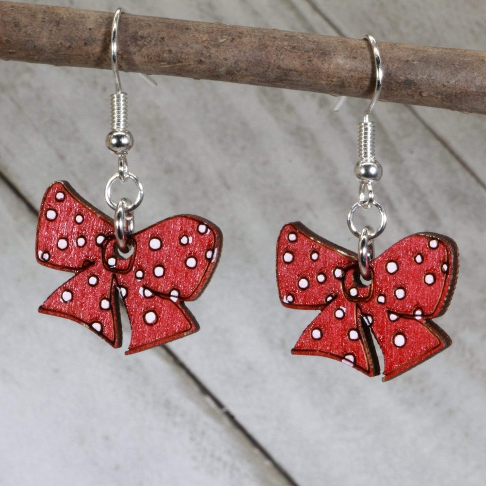 Add a sweet pop of charm to your look with these Red Bow Wooden Earrings—hand-painted, lightweight, and perfect for cute everyday style, festive outfits, and playful fashion lovers.