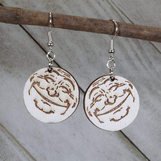Hand-painted wooden smiling moon dangle earrings featuring a crescent moon with a cheerful face and celestial detailing and hypoallergenic sterling silver hooks, lightweight jewelry for stargazers and whimsical night sky lovers by Cate’s Concepts