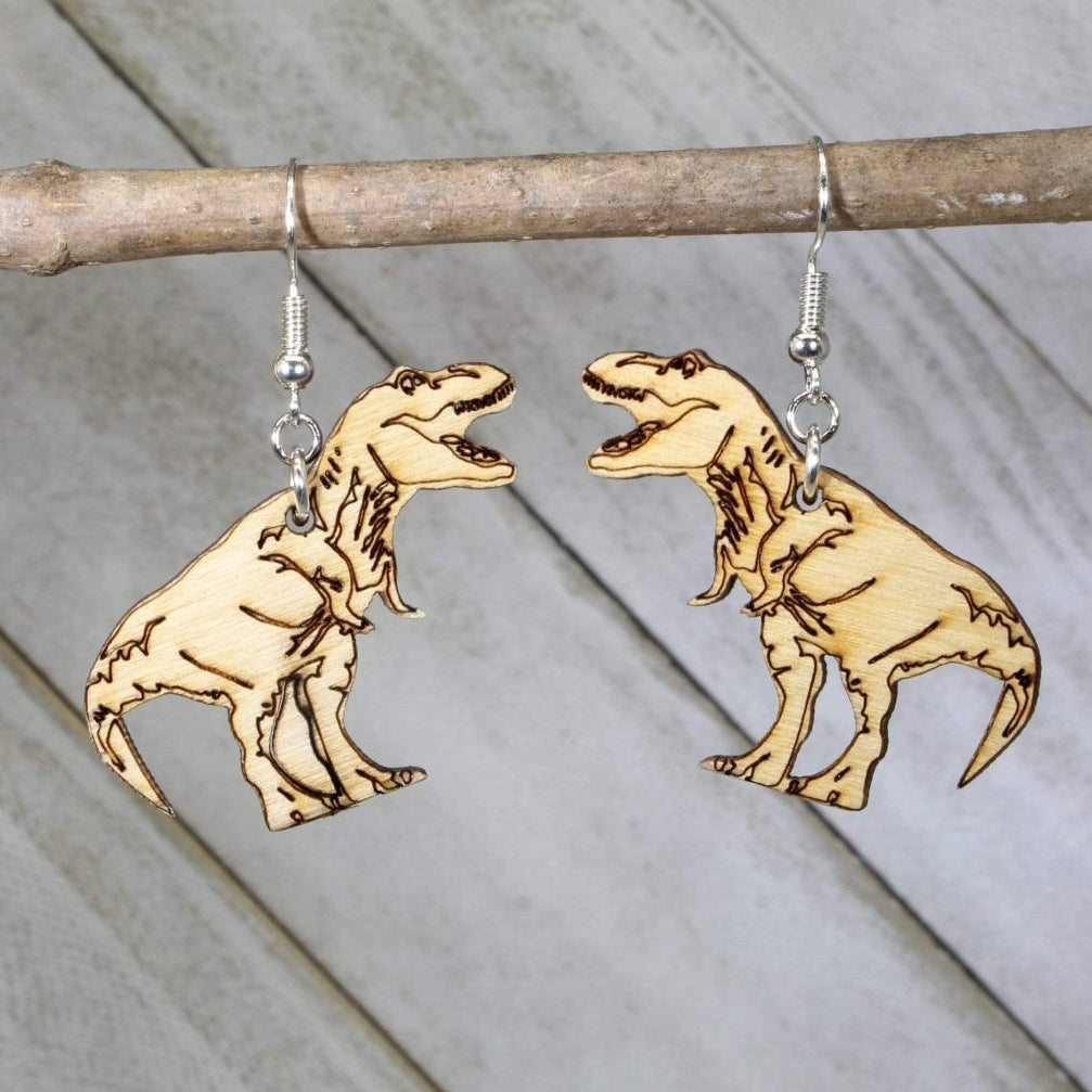 Hand-painted wooden T rex dinosaur dangle earrings with detailed prehistoric design and hypoallergenic sterling silver hooks, lightweight dinosaur statement jewelry earrings for dino lovers