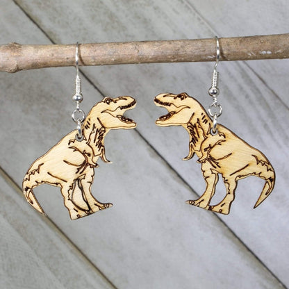 Hand-painted wooden T rex dinosaur dangle earrings with detailed prehistoric design and hypoallergenic sterling silver hooks, lightweight dinosaur statement jewelry earrings for dino lovers