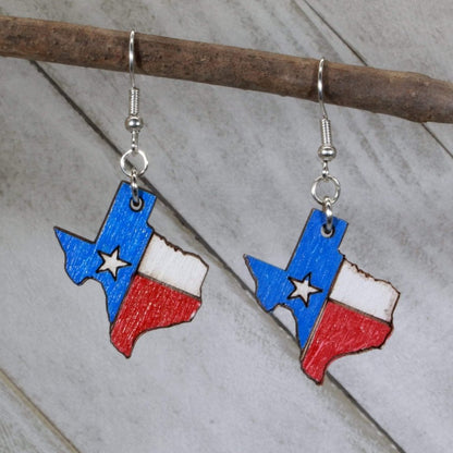 Hand-painted wooden Texas state flag dangle earrings with bold red white blue design and hypoallergenic sterling silver hooks, lightweight Texas flag statement jewelry earrings for state pride and patriotic style