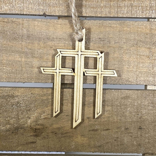 Hand-painted wooden triple cross Christmas ornament featuring three crosses with symbolic Christian design and rustic detailing, meaningful holiday decor for faith-based homes and religious celebrations by Cate’s Concepts