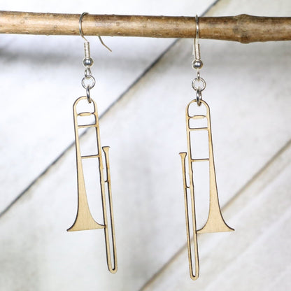 Hand-painted wooden trombone dangle earrings with detailed band instrument design and hypoallergenic sterling silver hooks, lightweight music jewelry for musicians, band students, and orchestra lovers