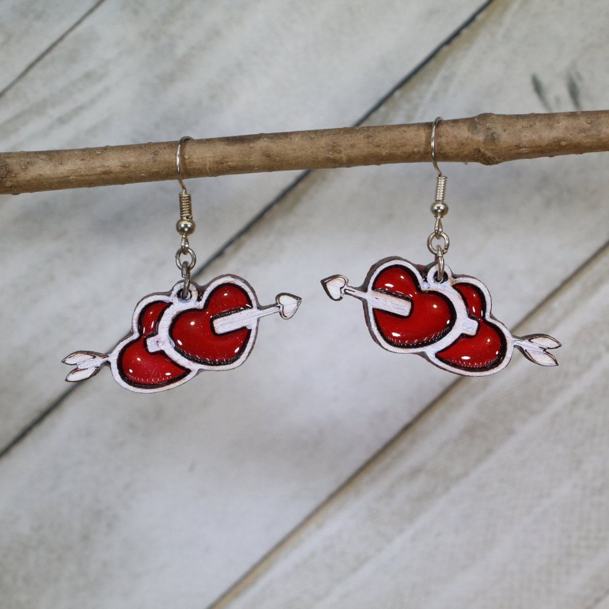 Hand-painted wooden two hearts arrow dangle earrings with romantic love design and hypoallergenic sterling silver hooks, lightweight heart statement jewelry earrings for Valentine’s Day and sweet everyday style